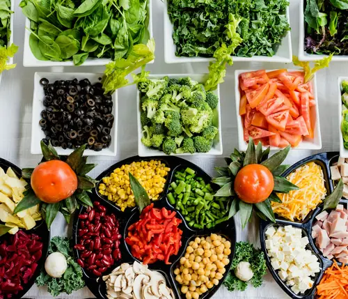 Assorted fresh produce and market food from above
